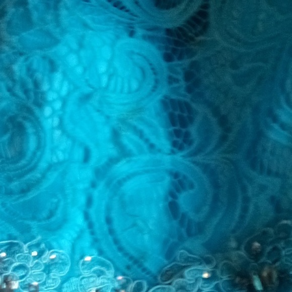 A blue dancing queen dancing  has one small spot on it shown in picture - Picture 3 of 3